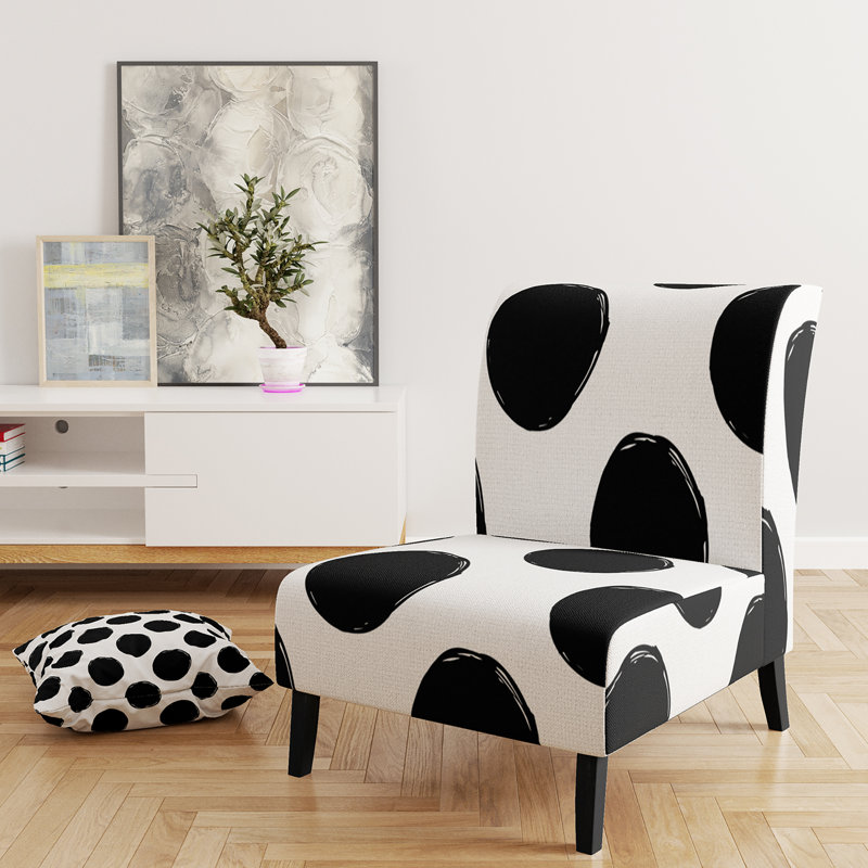Fauteuil de chambre rembourré à motif noir avec motif de cercles noirs