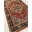 Kerri Oriental Area Rug in Rust