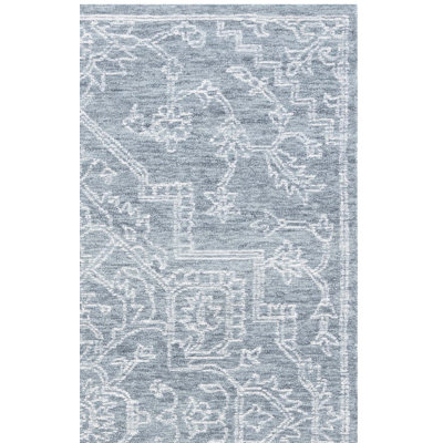 Tapis oriental bleu en coton touffeté Frachia
