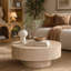 Table basse ronde de rangement avec finition beige travertin, couvercle amovible et rangement dissimulé