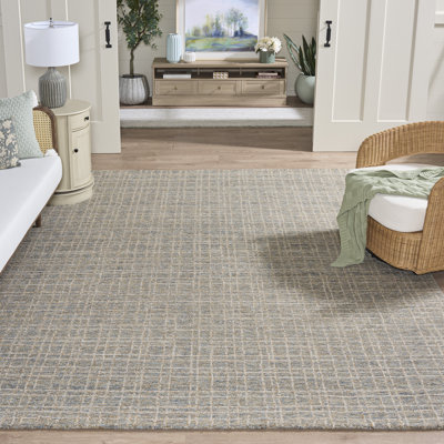 Tapis géométrique beige / bleu en jute de laine touffeté à la main Alvonia