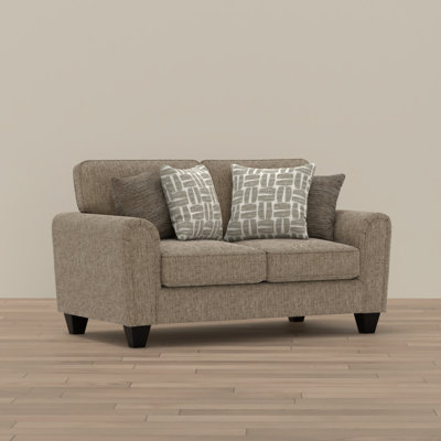 Tan Upholstered Loveseat with 4 Throw Pillows