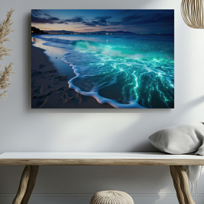 Canvas A Serene Beach Scene At Twilight Featuring Vibrant Bioluminescent Waves Wall Art Crashing Onto A Sandy Shore The Ocean Glows Canvas Wall Art