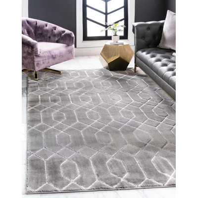 Tapis gris argenté à motif géométrique glam