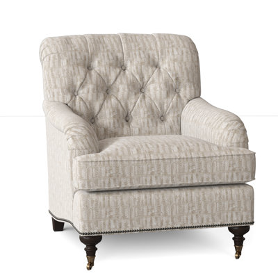 Fauteuil à coussin en duvet capitonné Devan