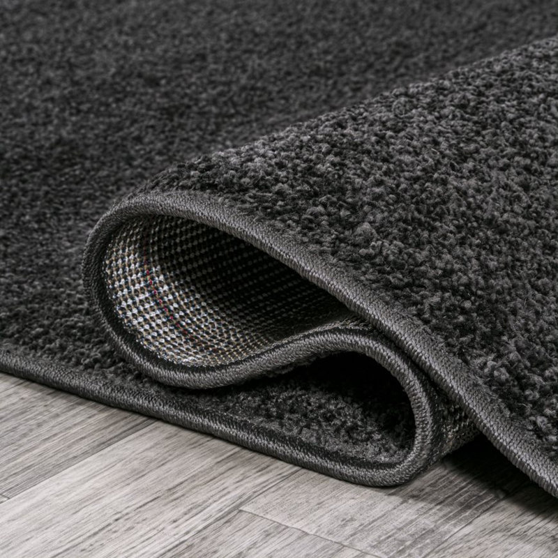 Tapis noir Asaldis, Ovale 3 pi x 5 pi