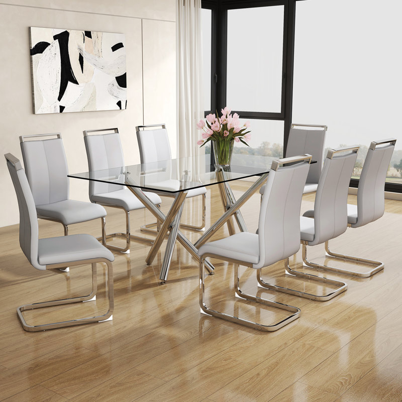 Daarina Modern Dining Table Set, Large Rectangular Glass Table with Silver X-Base and Faux Leather Cantilever Chairs, 9