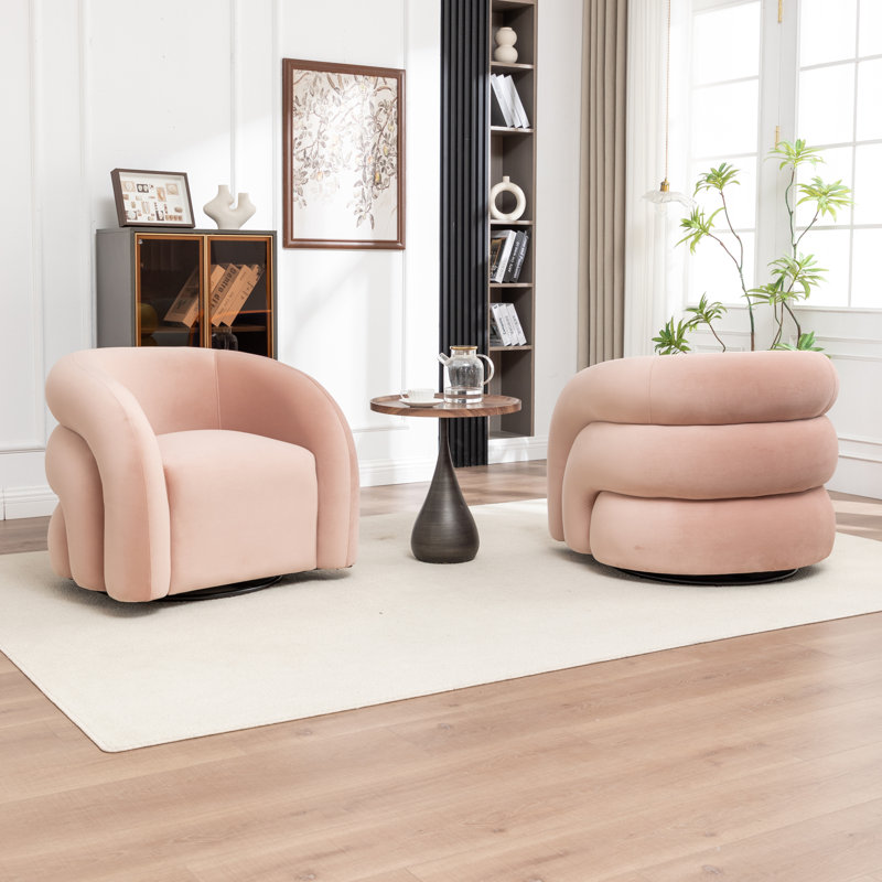 Fauteuil demi-tonneau pivotant rembourré Coyle, Rose
