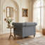 Fauteuil club capitonné