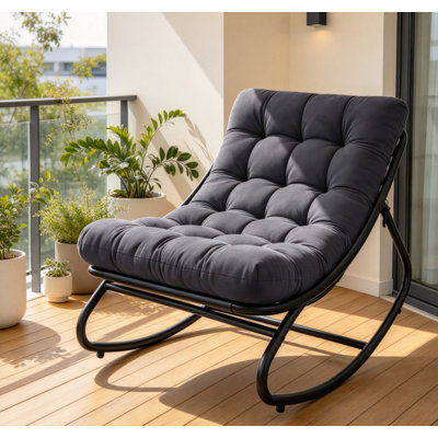 Fauteuil à bascule d'extérieur en acier thermolaqué avec coussin capitonné