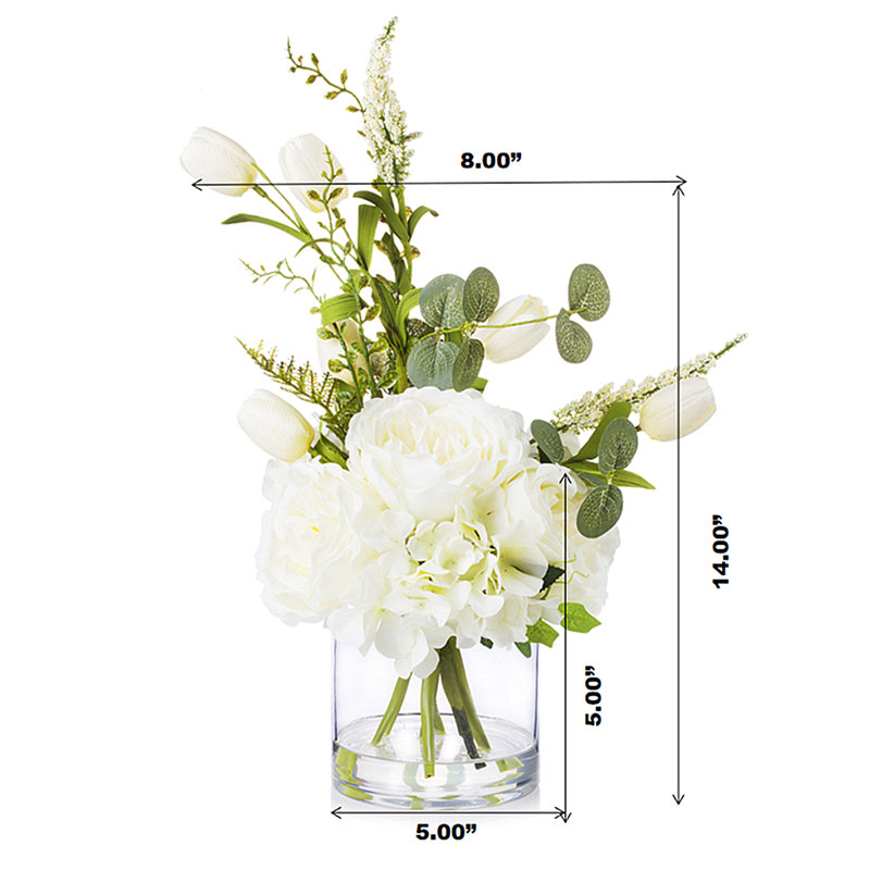 Pivoine hortensia et tulipe dans un vase en verre