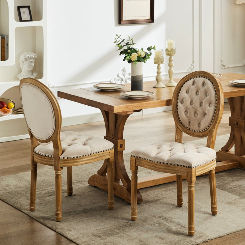 Élégante chaise de salle à manger rembourrée en velours beige avec pieds en velours et ressort en acier, Beige