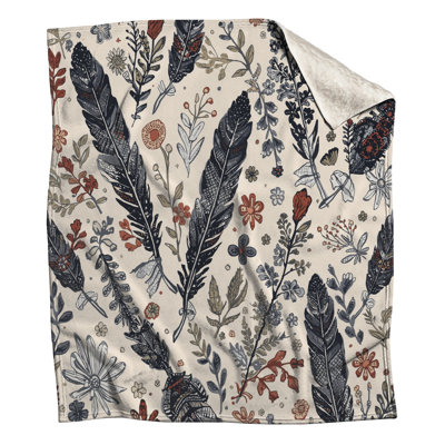 Plumes et couvertures de fleurs sauvages