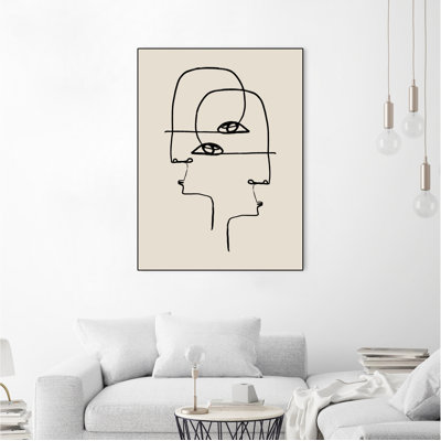 Toile encadrée de faces