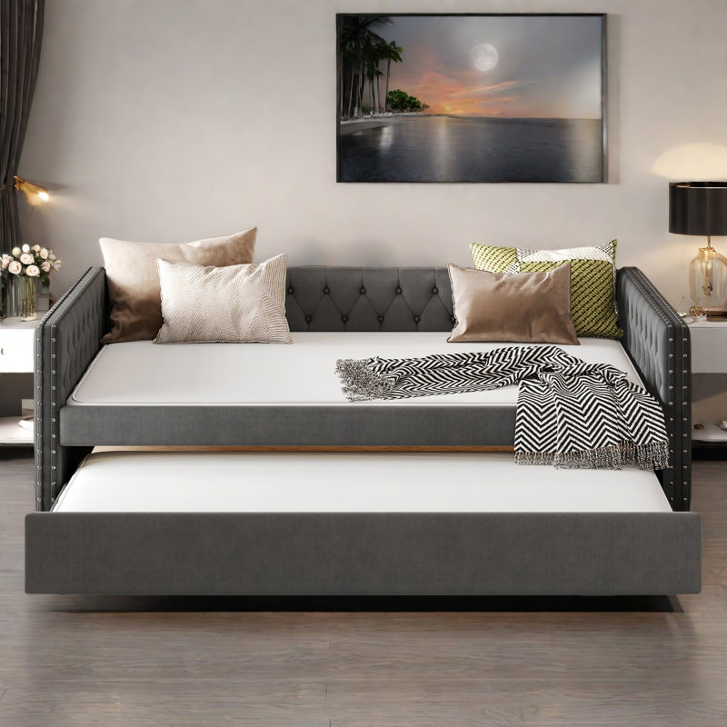 Lit de jour rembourré avec un bouton, un lit gigogne, une conception capitonnée et une décoration cloutée en cuivre , Gris