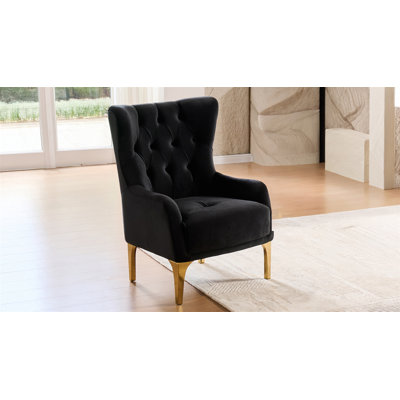 Chaise d'appoint rembourrée Lippa en tissu noir avec pieds en acier inoxydable doré, rembourrage en mousse et structure en bois robuste