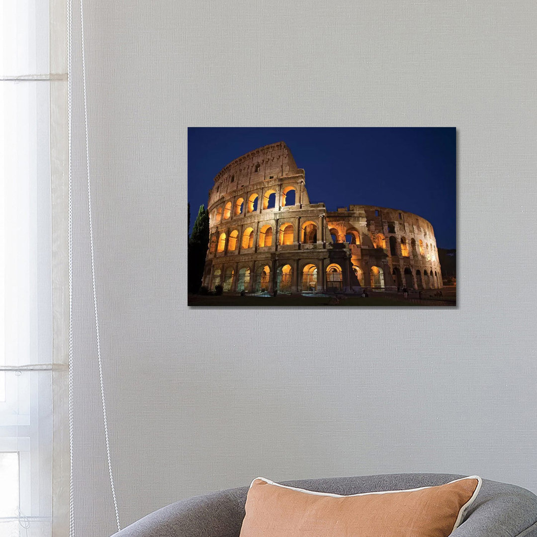 Italy, Rome, Colosseum. Night Scene At Landmark. by Jaynes Gallery - Wrapped Canvas Print
