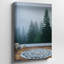 Toile une scène d'intérieur sereine avec une peinture murale brumeuse sur un mur gris clair représentant de grands arbres à feuilles persistantes-454344691