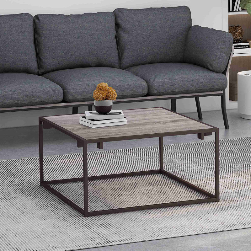Table basse moderne et industrielle, gris et bronze