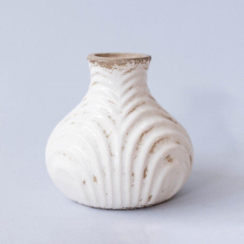 Texturé avec une finition rustique vieillie. Vase