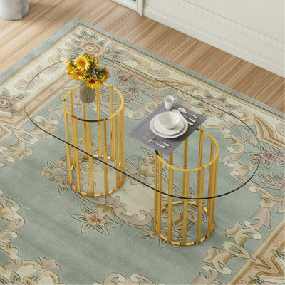 Table de salle à manger ovale en verre trempé de 71 pouces de style luxueux à double colonne dorée, en verre trempé résistant aux égratignures et facile à nettoyer. Convient pour une salle à manger de 6 à 8 personnes.