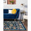 Tapis bleu / jaune / orange à motif floral Arenas-451648569