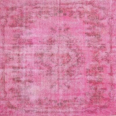 Tapis floral en laine rose clair