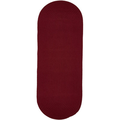 Tapis intérieur / extérieur rouge tressé à la main Smyth