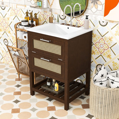 Meuble-lavabo compact élégant avec lavabo en céramique, façade en rotin et rangement ouvert
