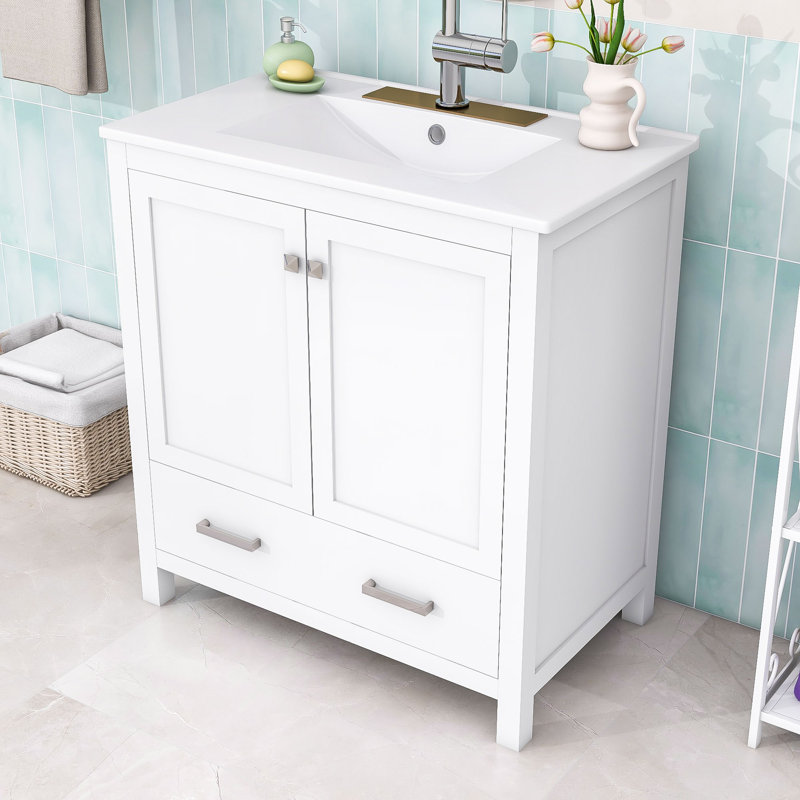 Ensemble de meuble-lavabo simple autoportant en bois avec lavabo en céramique Ordonez, portes à fermeture douce et grand espace de rangement