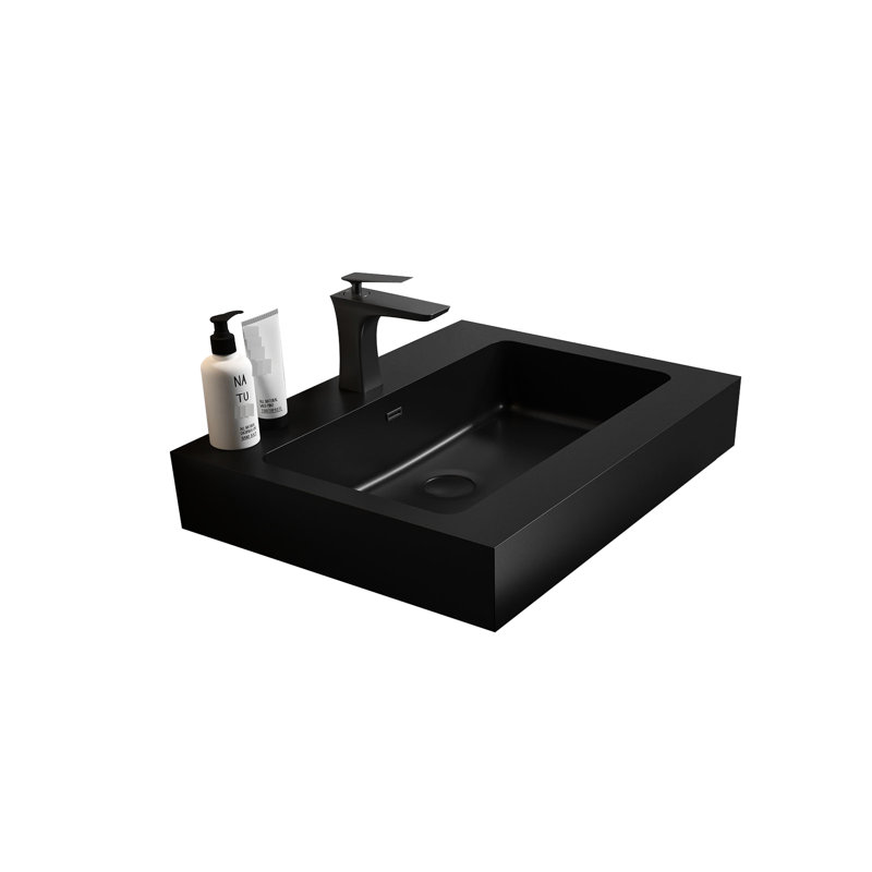 La cuve intégrée en quartz noir mat permet une utilisation fonctionnelle et élégante