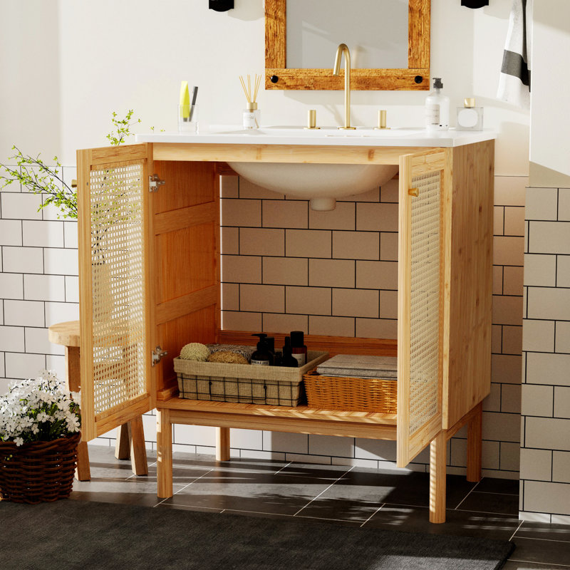 Meuble-lavabo contemporain avec portes en rotin et mécanismes de fermeture en douceur