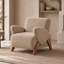 Fauteuil d'appoint moderne et compact en velours, avec accoudoirs incurvés et pieds en bouleau massif, idéal pour le salon, le bureau ou la pièce à vivre.-1983379831
