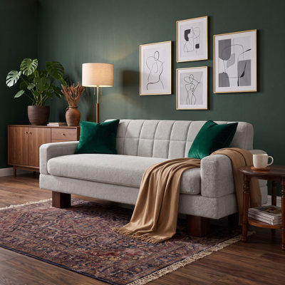 Canapé rembourré avec dossier capitonné, accoudoirs carrés et siège à coussin épais pour le salon ou un appartement