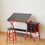 Table à dessin rouge avec tabouret