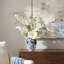 Magnolia and Delphinium Arrangement in a Decorative Ceramic Vase