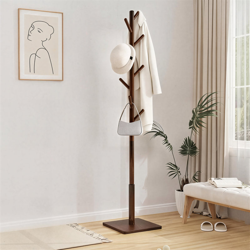 This Brown, Sturdy Floor-Standing Coat Rack Features A Solid Square Base, Eight Built-In Hooks, And Is Easy To Assemble. It's Suitable For Storing Clothes And Hats In Bedrooms, Entryways, And Offices.