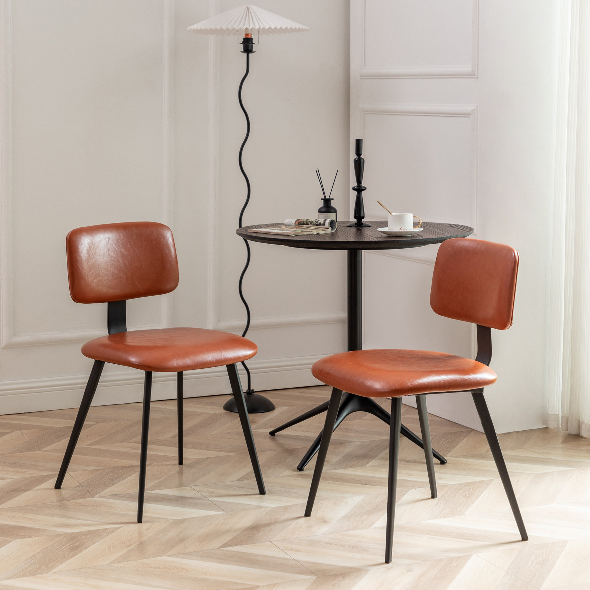 Orange faux leather online dining chairs