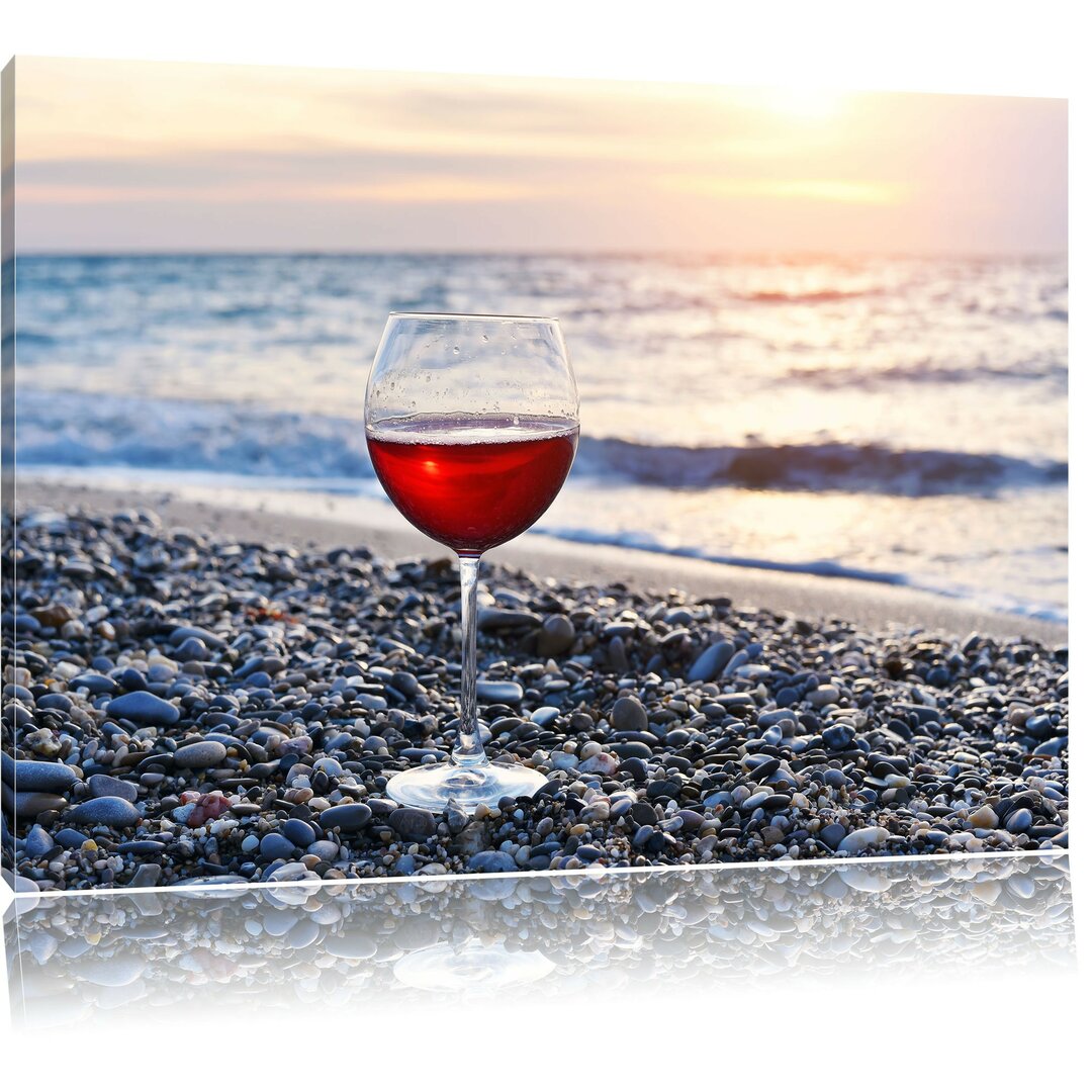 Leinwandbild Wineglass on a Beach