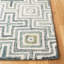 Tapis ivoire / bleu touffeté à la main Gladies-59776140