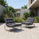 Chaise berçante d'extérieur en acier avec coussins amovibles Caili