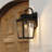 Irving Park 13.75 In. H 1-Light Textured Black Outdoor Wall Sconce Made Of Durable Steel, Clear Seeded Glass Shade, LED Compatible, Use For Exterior Porch Patio Front Door Or Garage