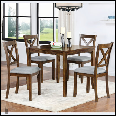 Élégante table de salle à manger en bois 5 pièces avec 4 chaises, parfaite pour les cuisines et les salles à manger modernes, alliant style et fonctionnalité.