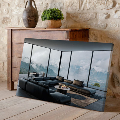 Canvas A Modern Minimalist Living Room Featuring A Sleek Black Leather Wall Art Sectional Sofa Arranged Around A Low Round Coffee Canvas Wall Art