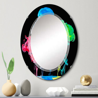 Encre rouge, bleue et verte, art liquide sur fond noir - miroir mural moderne ovale