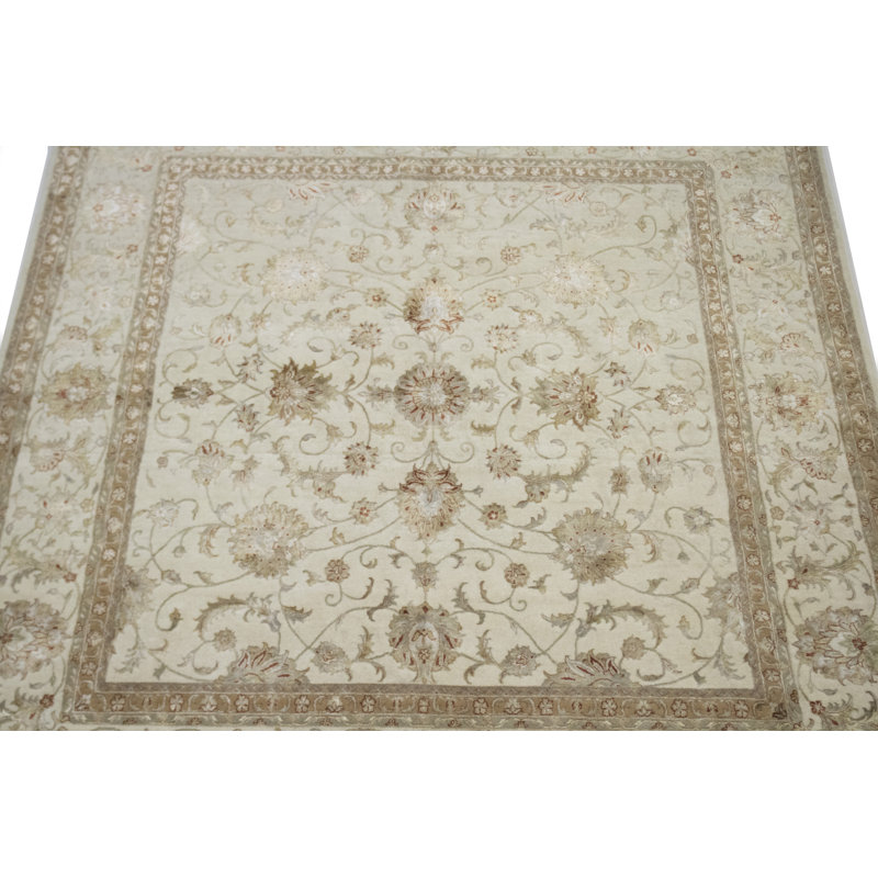 Tapis beige à motif floral Leming