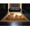 Tapis oriental classique brun / beige à motif de moai polynésien lavable à la machine Orsolya