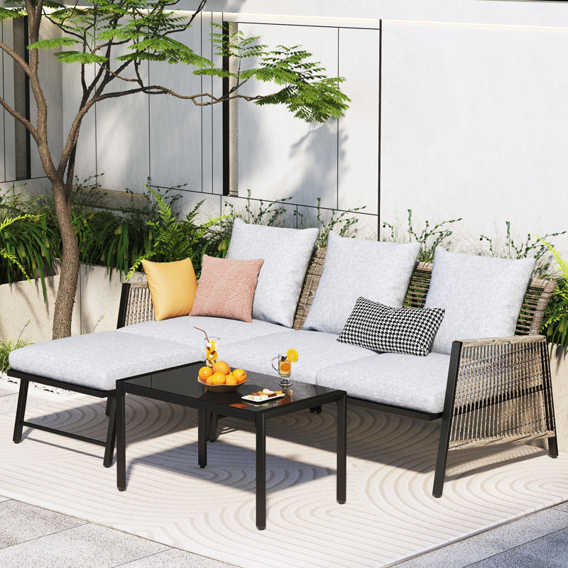 Keisen Wicker 4 - Person Patio Conversation Set with Cushions