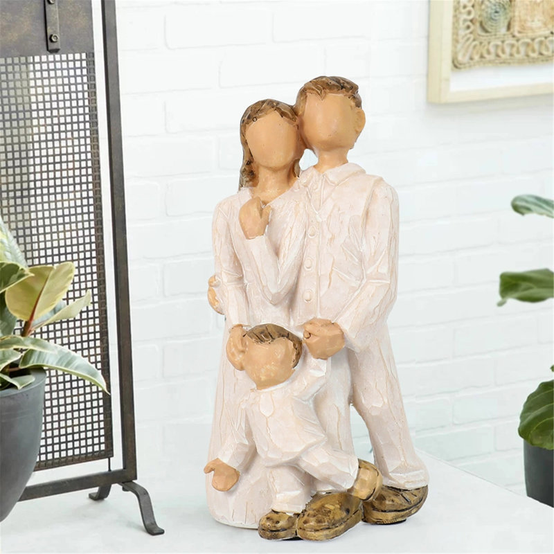 Mère père enfant famille sculptée