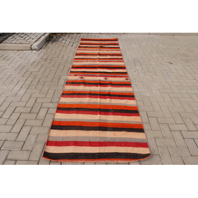 Handwoven Turkish Runner Rug With Vibrant Red Orange Beige Tones And Unique Patterns For Vintage Home Decor